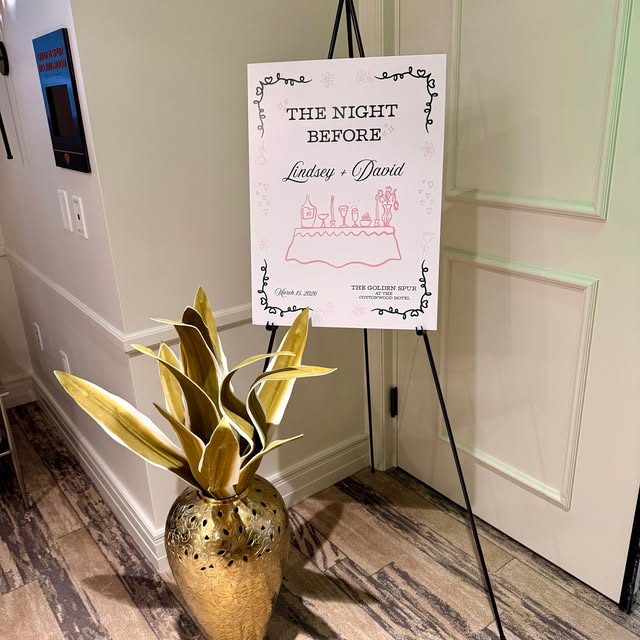 Personalized wedding welcome sign on a black easel